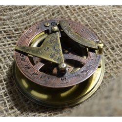 Sun-dial and compass